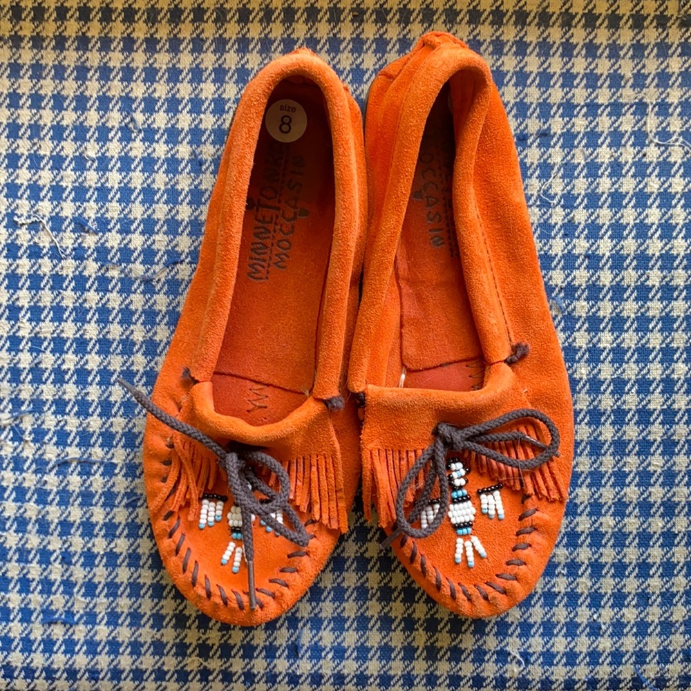 Awesome orange Minnetonka mocs! Size 8